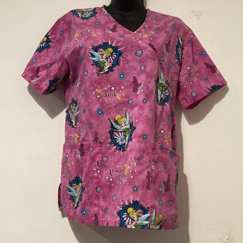 Disney Beautiful Pink Tinker Bell Scrub . Colorful pink scrub top in excellent